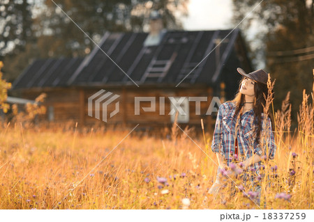American portrait of a young woman farmer Indian Summer 18337259