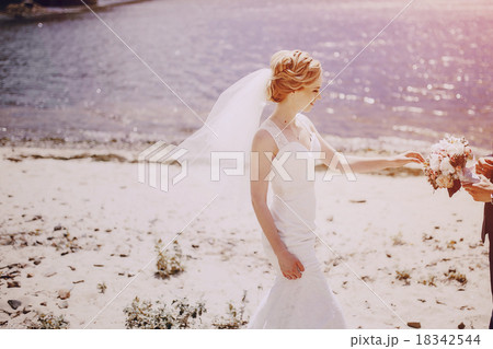 couple on the lake beach 18342544