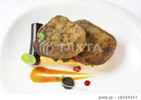 foie gras with corn bread on a table in a restaura foie gras with corn bread on a table in a restaura 18344357