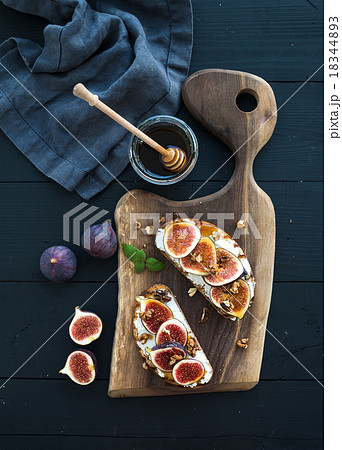 Sandwiches with ricotta, fresh figs, walnuts and Sandwiches with ricotta, fresh figs, walnuts and 18344893