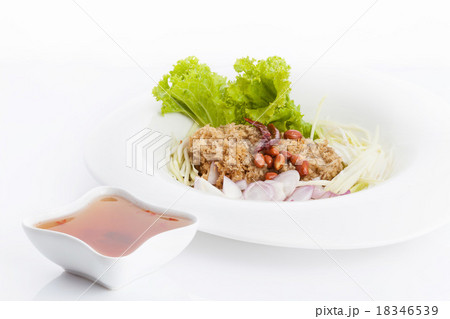 Crispy catfish salad on white dish Crispy catfish salad on white dish 18346539
