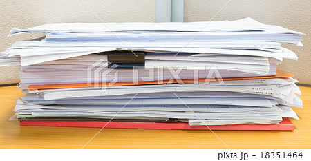 pile of documents on the office desk 18351464
