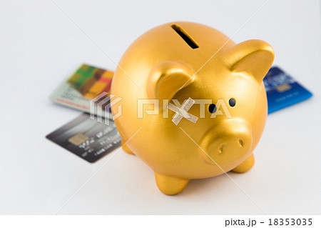 Piggy bank hurt from debt concept Piggy bank hurt from debt concept 18353035