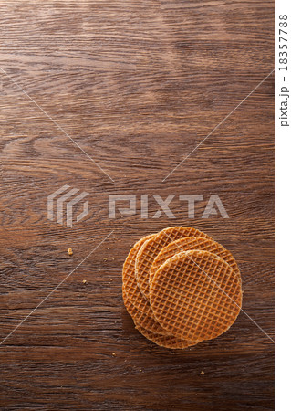 Waffles with caramel on wood 18357788