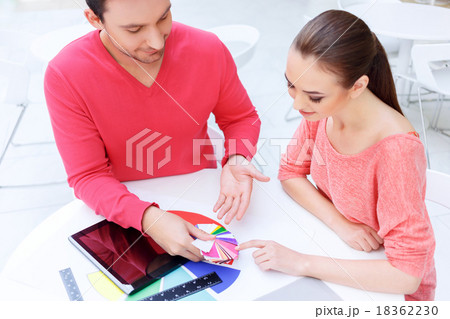 Female designer picks the color she approves. Female designer picks the color she approves. 18362230