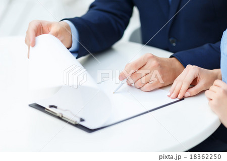 Office workers are busy with form-filling. Office workers are busy with form-filling. 18362250