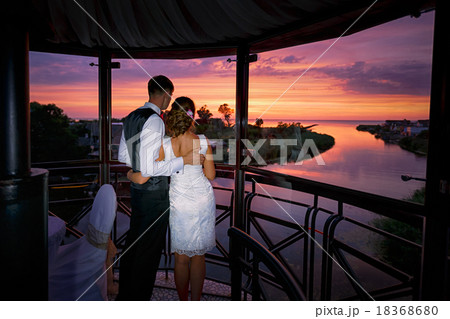 Wedding couple in love at sunset time 18368680