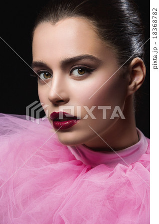 Beautiful girl with bright makeup 18368782