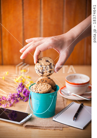 Chocolate chip cookies in small green bucket Chocolate chip cookies in small green bucket 18374641