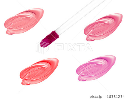 Different lip glosses isolated on white Different lip glosses isolated on white 18381234