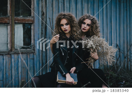 Two vintage witches gathered eve of Halloween 18385340
