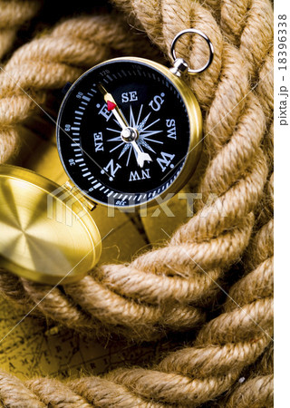 Close up view of the compass on old map Close up view of the compass on old map 18396338
