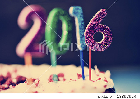 glittering numbers forming number 2016 on a cake 18397924