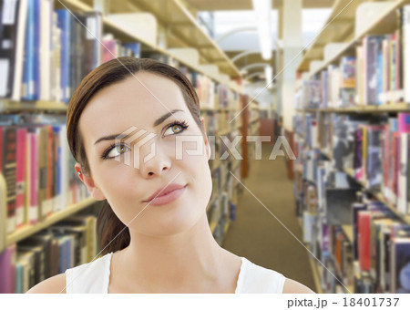 Mixed Race Girl Looking to the Side in the Library 18401737