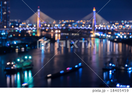 Blurred skyscrapers with city bokeh lights  18405459