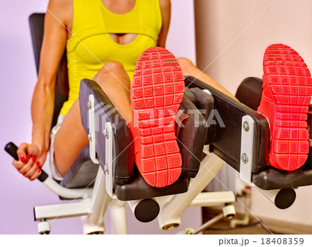 Girl workout on leg press. Girl workout on leg press. 18408359