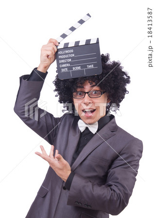 Man with movie clapper isolated on white Man with movie clapper isolated on white 18413587