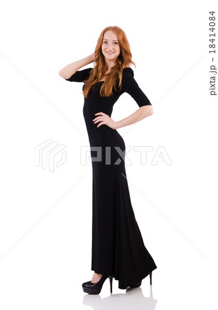 Redhead in black dress isolated on white Redhead in black dress isolated on white 18414084