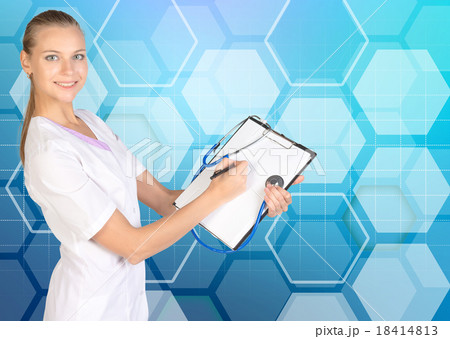 Clip board. Stethoscope. The doctor fills out a Clip board. Stethoscope. The doctor fills out a 18414813
