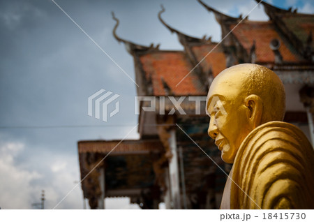 Golden Buddha with beautiful ancient temple in Golden Buddha with beautiful ancient temple in 18415730