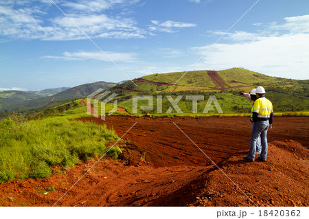 Mining construction workers on mountain top 18420362