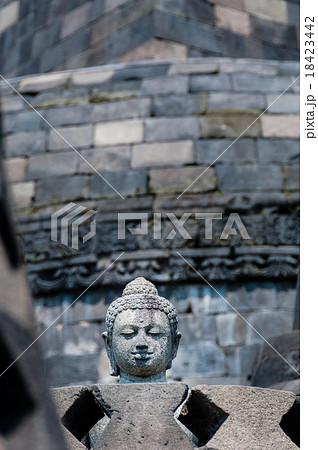 Stone Buddha Head in stupa at Borobudu Stone Buddha Head in stupa at Borobudu 18423442