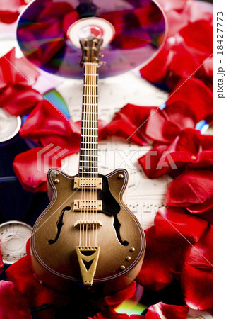 Discs and guitar, bright colorful vivid theme Discs and guitar, bright colorful vivid theme 18427773