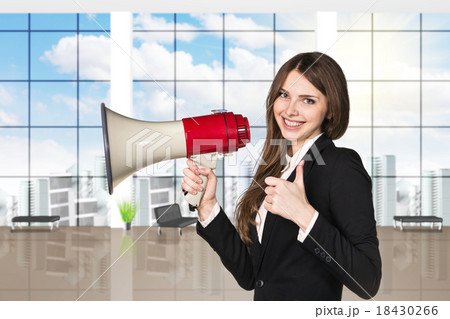 businesswoman with megaphone and thumbs up businesswoman with megaphone and thumbs up 18430266