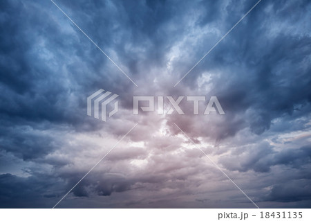 Dramatic clouds at dusk 18431135