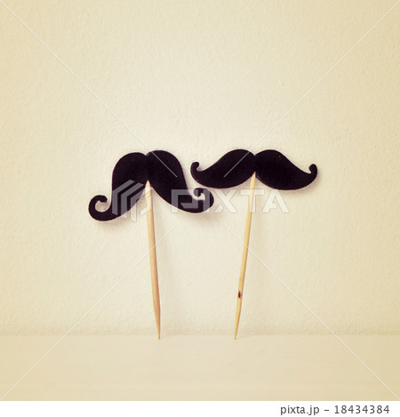 felt mustaches in sticks, retro effect 18434384