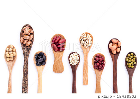 Assortment of beans and lentils in wooden spoon Assortment of beans and lentils in wooden spoon 18438502