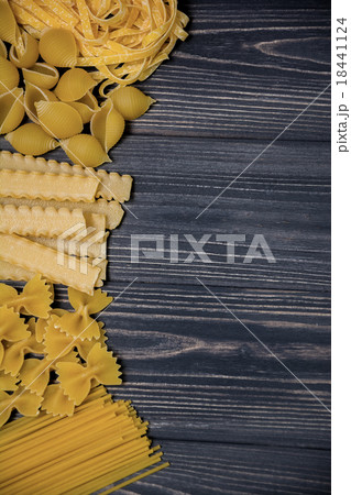 Pasta mix on wooden background 18441124