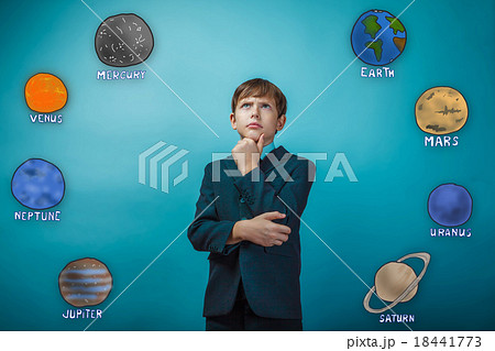 Businessman young teenager boy thinks the planet 18441773