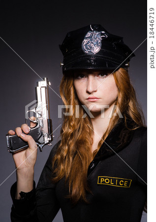 Woman police office with gun 18446719