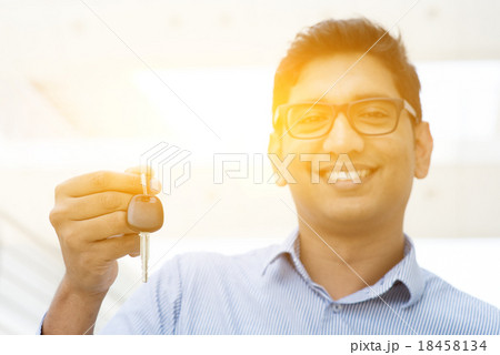 Man hand holding new car key Man hand holding new car key 18458134