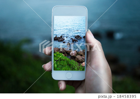 Women hand using smart phone with take photo Women hand using smart phone with take photo 18458395