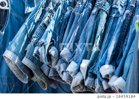 jeans hanging on hangers jeans hanging on hangers 18459184