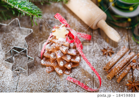 Homemade baked Christmas gingerbread tree on vintage wooden back Homemade baked Christmas gingerbread tree on vintage wooden back 18459803