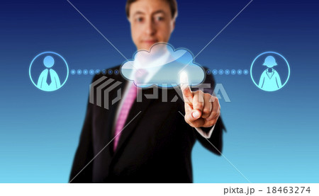 Smiling Businessman Contacting Workers Via Cloud Smiling Businessman Contacting Workers Via Cloud 18463274