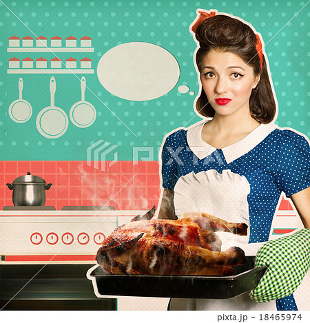 Young woman overlooked roast chicken in an oven 18465974