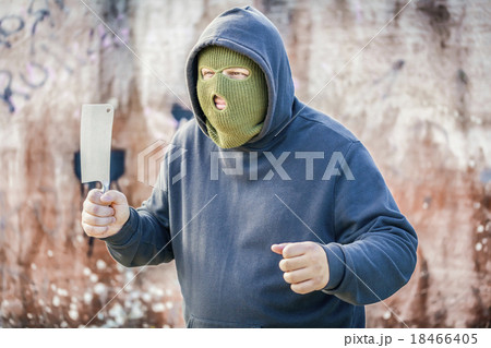 Dangerous man with knife near wall Dangerous man with knife near wall 18466405
