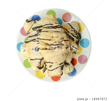 Chocolate croissants, isolated on a white plate 18467872