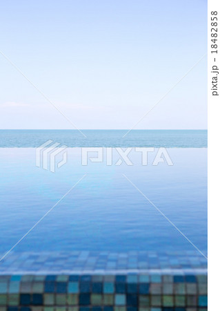 Luxury Infinity swimming pool with blue sky 18482858