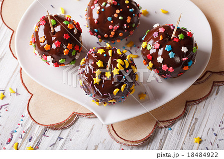 apples in chocolate with candy sprinkles top view apples in chocolate with candy sprinkles top view 18484922