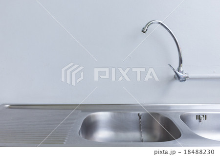 stainless steel sink and faucet in white kitchen stainless steel sink and faucet in white kitchen 18488230