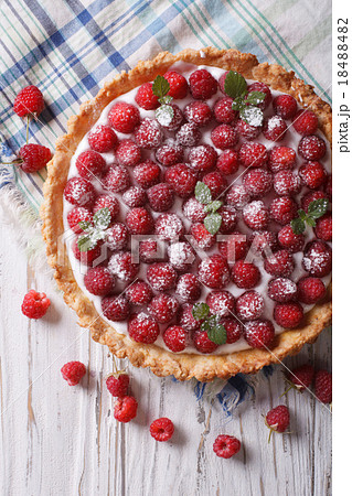 Fresh raspberry tart with cream cheese top view 18488482