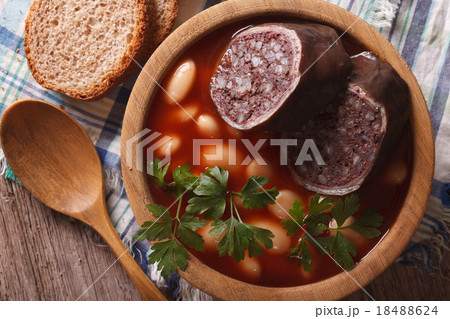 Bean soup with sausage morcilla closeup top view 18488624