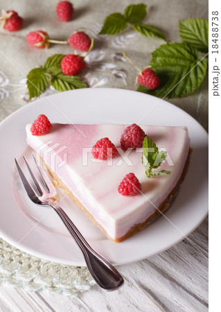 piece of raspberry cheesecake close-up on a plate 18488738