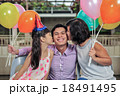 Young Asian family mom and girl show love to dad 18491495