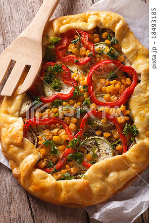 Homemade vegetable pie on a table closeup top view 18493185